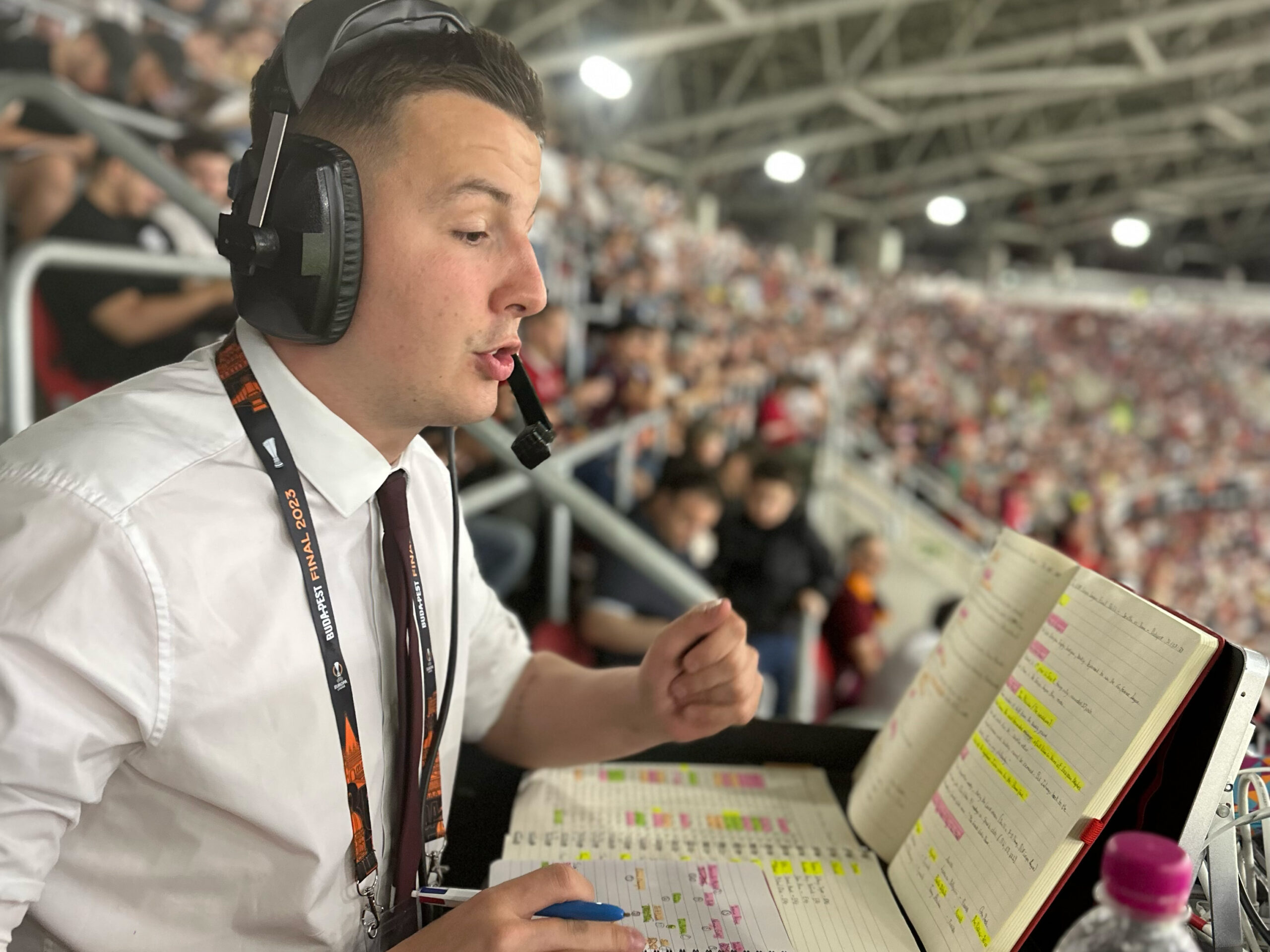 Elliott Stockdale Thurlow delivering audio description commentary (ADC) at the Europa League Final 2023