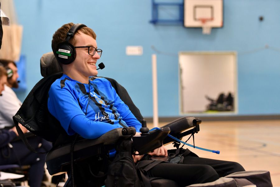 A photo of a wheelchair user and ADC trained commentator.